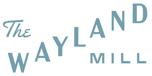 The Wayland Mill logo, an all-day cafe and restaurant on North Lake Union in Seattle
